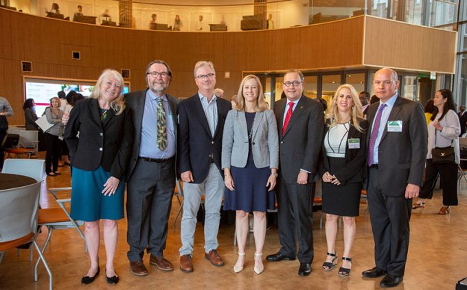 Michal Grinstein-Weiss is joined by Chancellor Martin, Provost Thorp, and various Brown School leaders for the SPI event