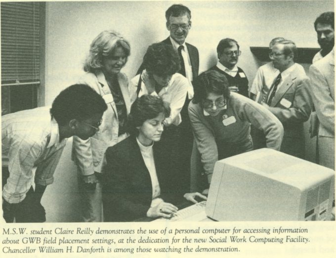 Social work computing facility. In 1983, GWB opened a new computing facility. Chancellor William H. Danforth, along with students and staff, watched a demonstration of a new computer being used to access information about social work field placements.