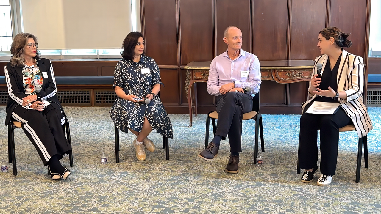 The panel was led by Mitra Naseh (right), assistant professor and director of the Forced Migration Initiative at the Brown School. (Photo: Bati Sevinc)