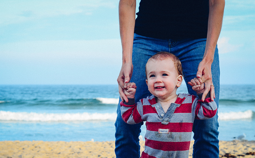 Baby Walking on Beach with Dad