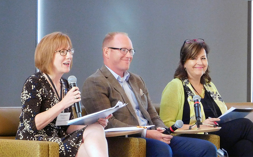 Margaret Clancy, left, speaks to state treasury officials and 529 program managers from 18 states and the District of Columbia during the Child Development Account Forum in July 2018 at the Brown School.