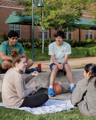 Students sitting outside