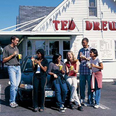 People outside Ted Drews. 